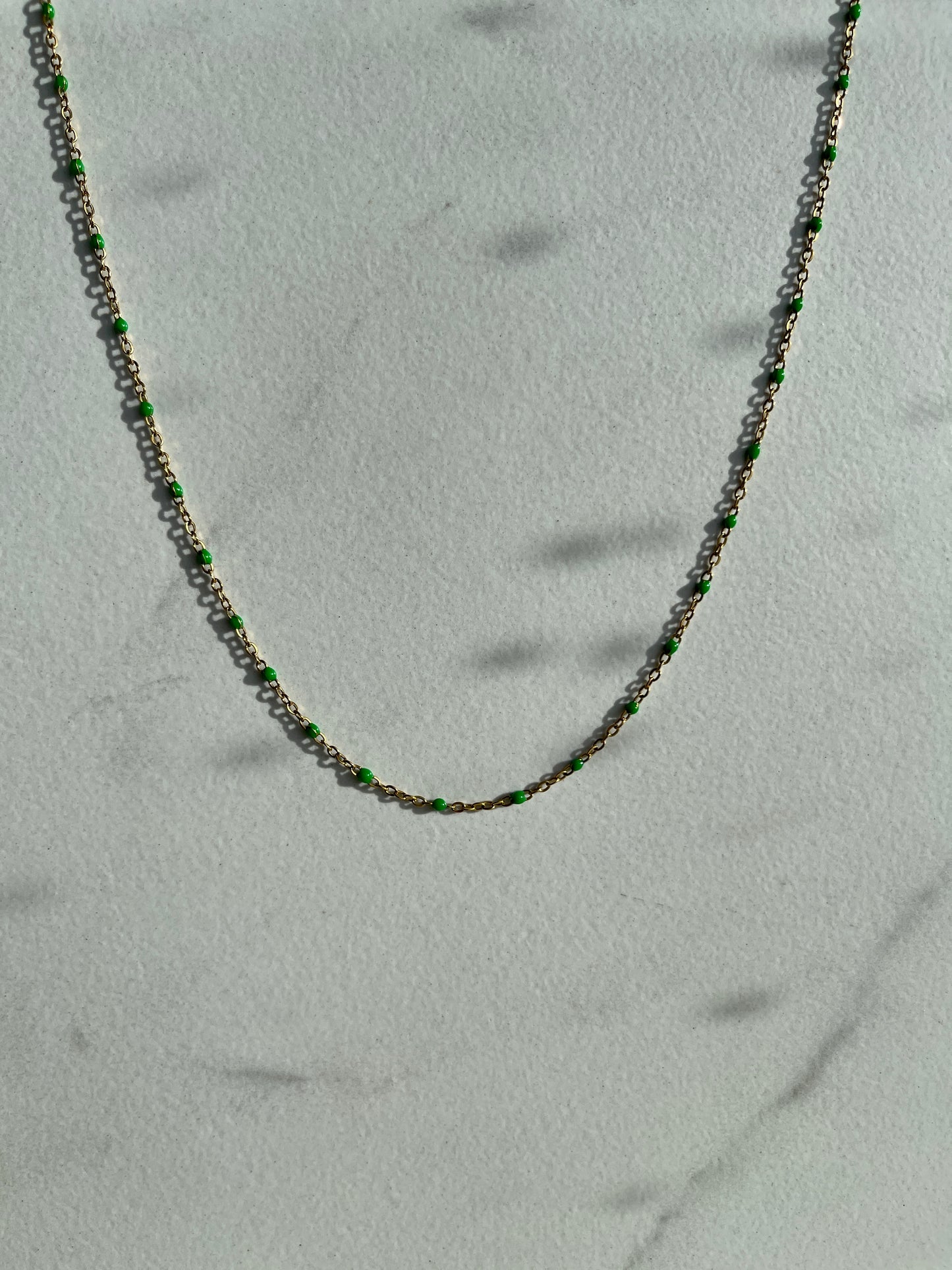 Green enamel chain gold 
necklace