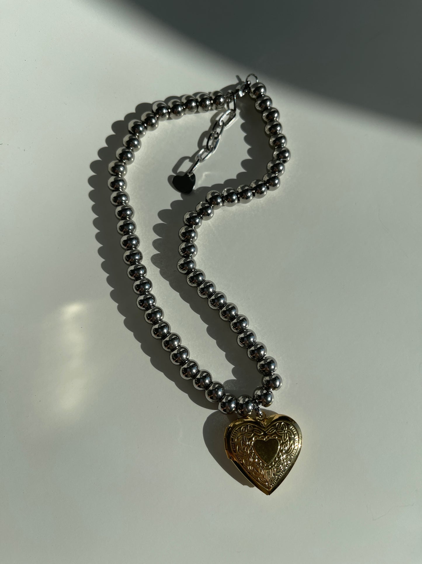 Gold heart locket pendant & chunky silver beaded necklace