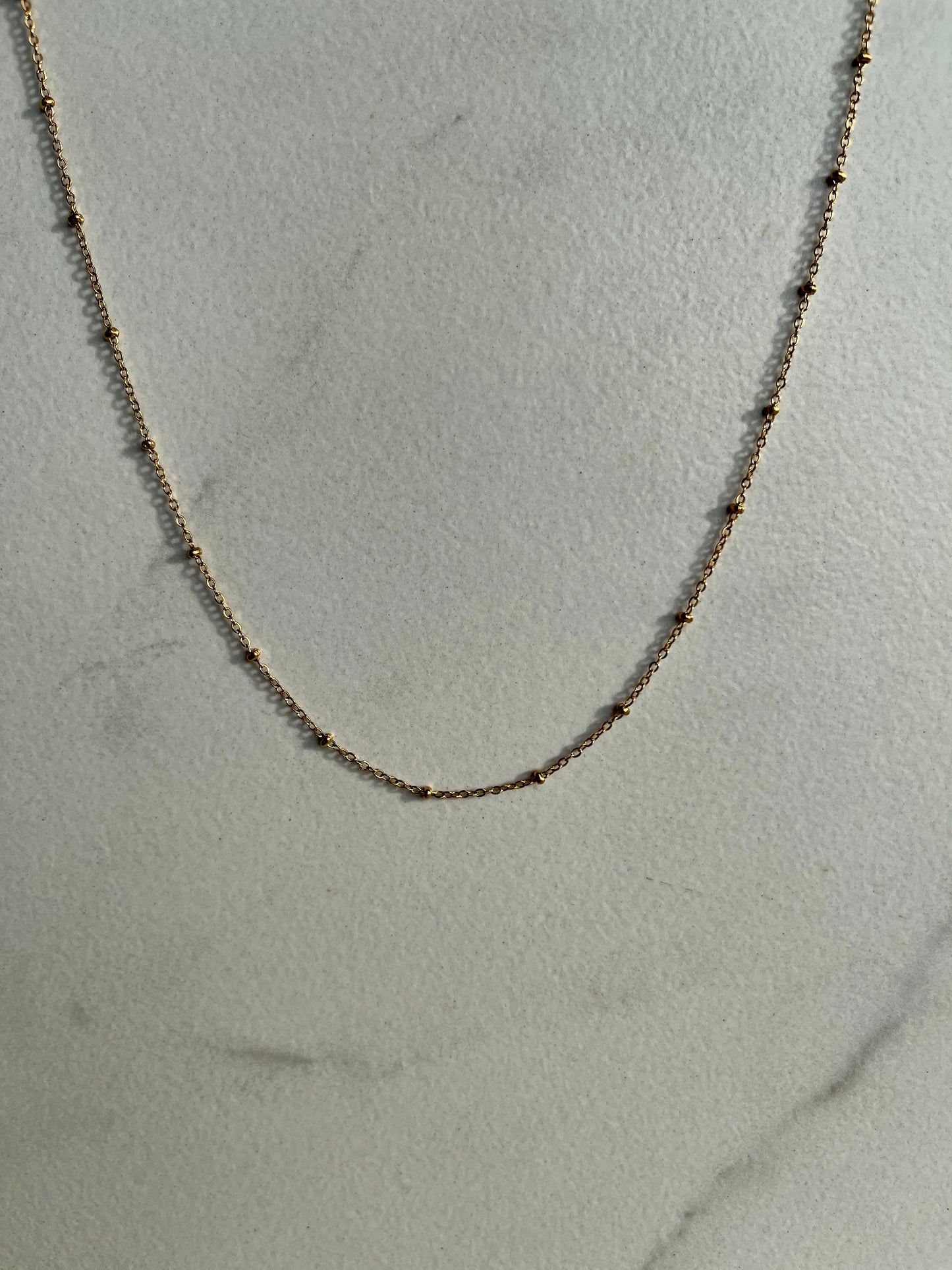 Gold ball chain 
necklace