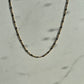 Black enamel chain gold 
necklace