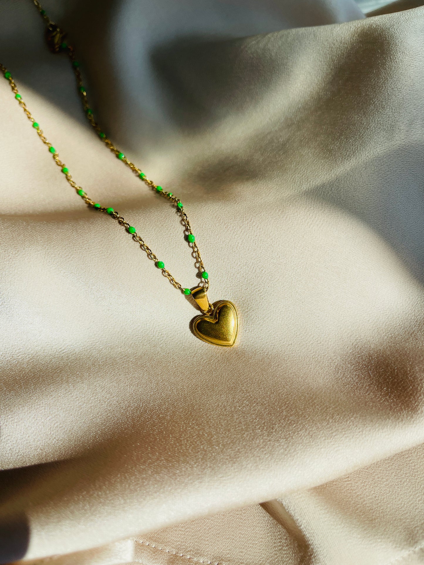 Amara heart pendant with green enamel necklace